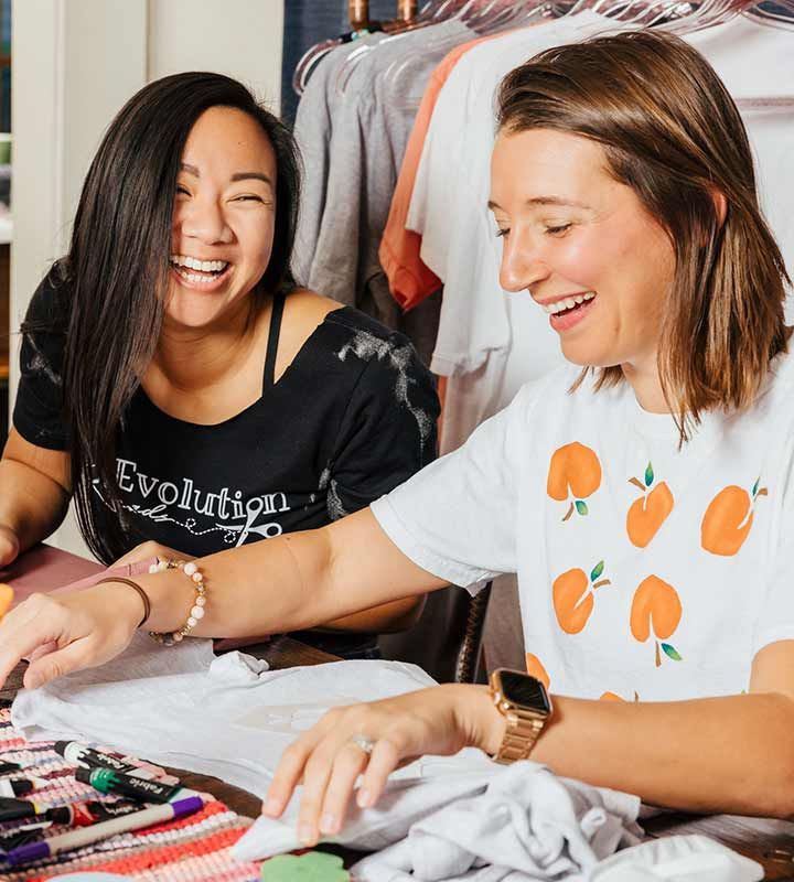 Friends at a craft party with Evolution Threads kits