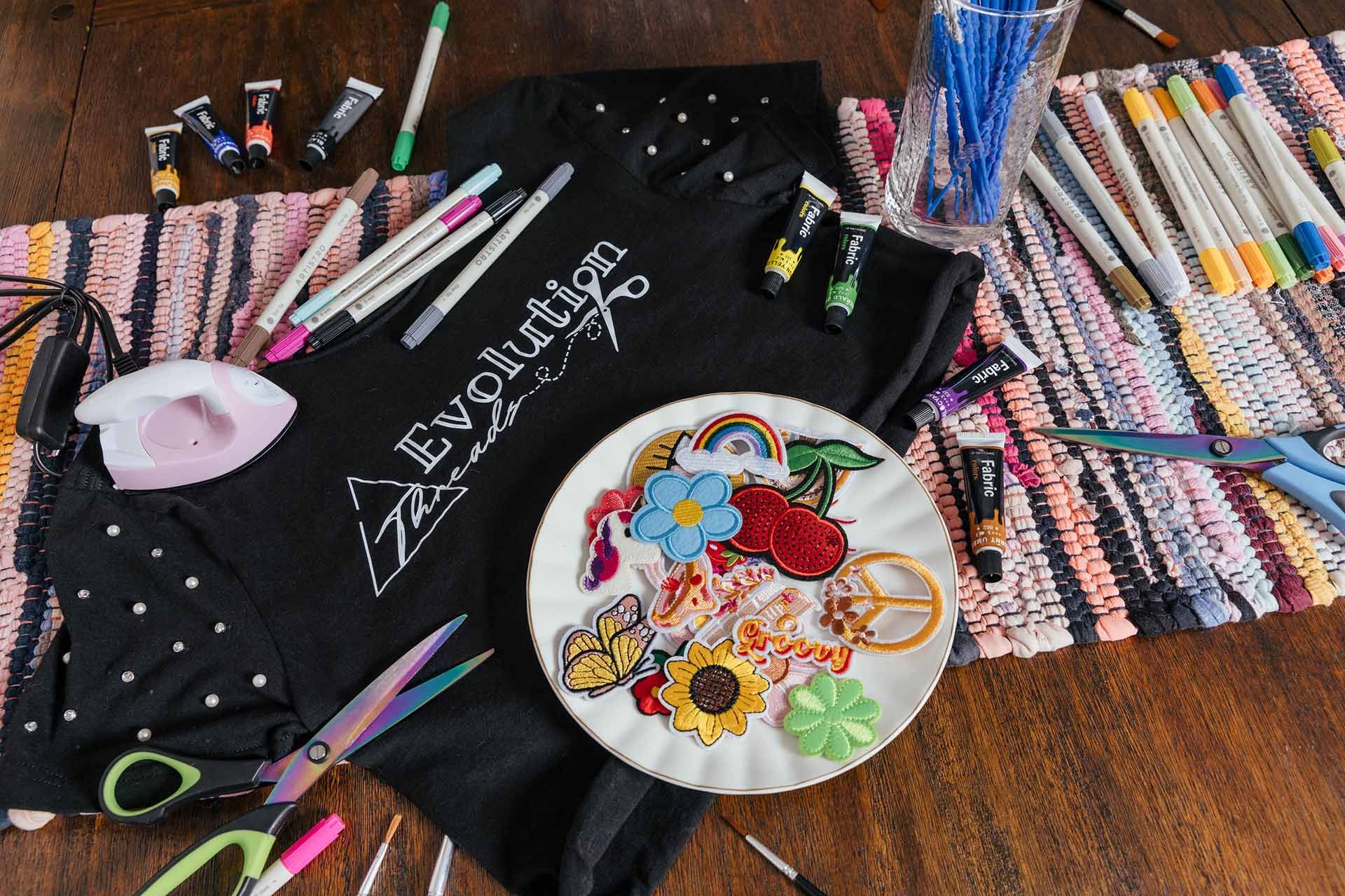 Evolution Threads materials and crafts laying on a table